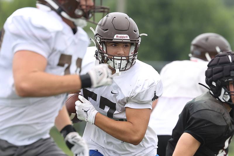 Joliet Catholic’s Nate Magrini cuts upfield after a catch during a scrimmage against Plainfield North on Thursday, July 13th, 2023 at Plainfield North