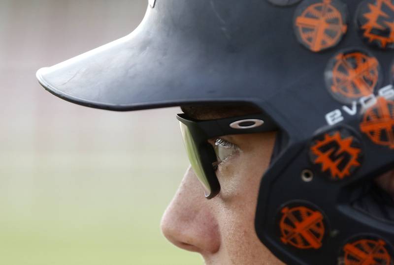McHenry's Carver Cohn watches a pitch as he warms up in the on deck circle during a Fox Valley Conference baseball game against Huntley on Tuesday, May 8, 2026, at Huntley High School.