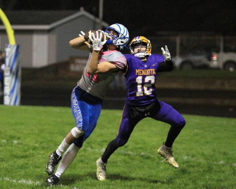 Princeton junior Noah LaPorte hauls in a 43-yard touchdown pass from quarterback Will Lott in the first quarter of Friday's 55-0 win over Mendota at Bryant Field.