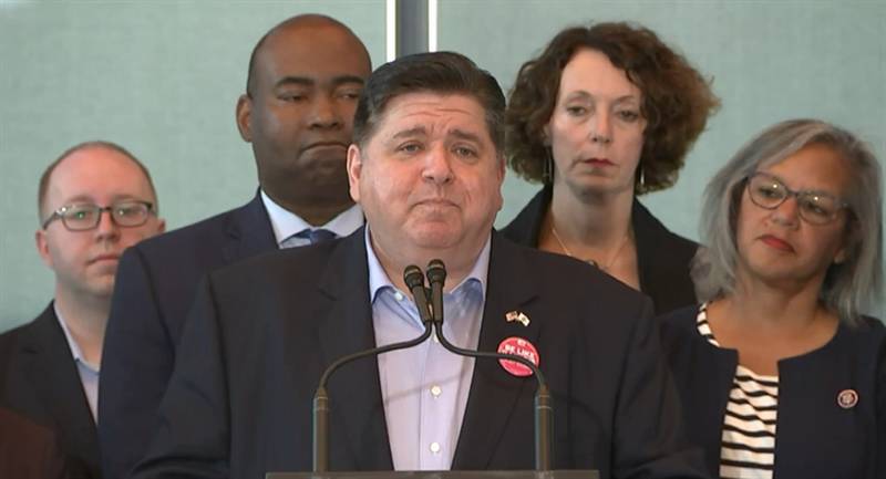 Gov. JB Pritzker speaks at a news conference Tuesday in Chicago with members of the Democratic National Committee in an attempt to land the 2024 DNC convention for the city of Chicago. At the right is U.S. Rep Robin Kelly, who chairs the state’s Democratic Party.