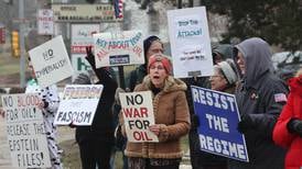 DeKalb rally draws dozens against US military operation in Venezuela 