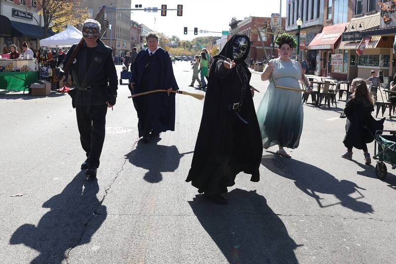 Adults joined the fun also as group of Harry Potter fans walk up Liberty Streetthe Magic in Morris event on Saturday.