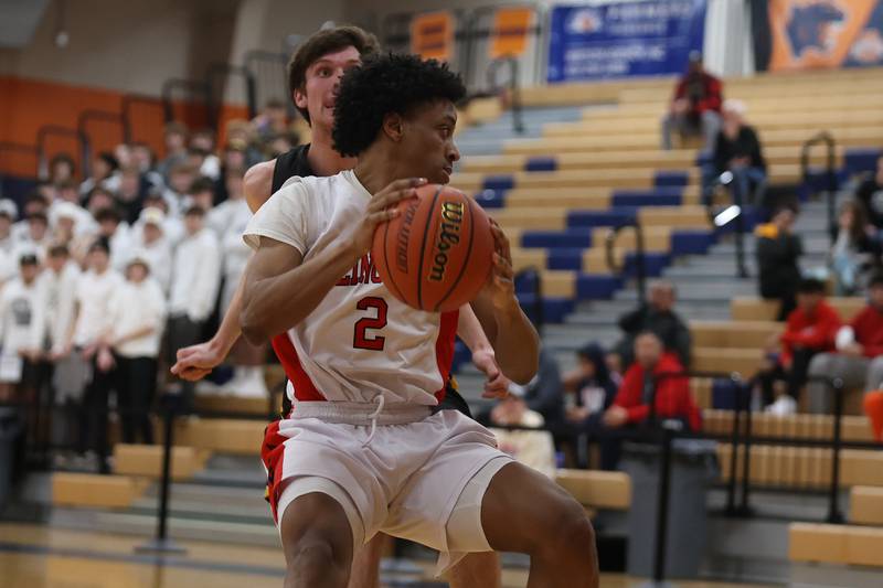 Bolingbrook’s Jaydin Dunlap looks to make a play against Andrew in the Class 4A Oswego Sectional semifinal. Wednesday, Mar. 2, 2022, in Oswego.