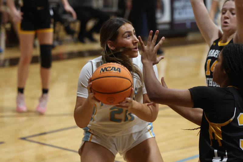 Joliet Catholic’s Ryan Stobaugh looks to take a shot against Marian Catholic on Monday, Dec. 9, 2024 in Joliet.