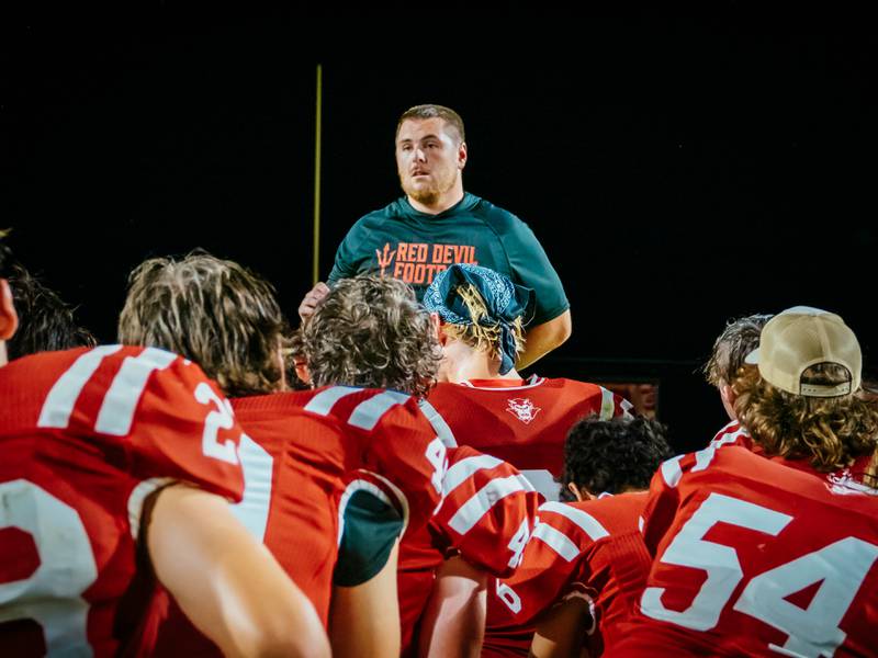 Hall Coach talks to players after loss on Friday, August 30, 2024 at Richard Nesti Stadium in Spring Valley.