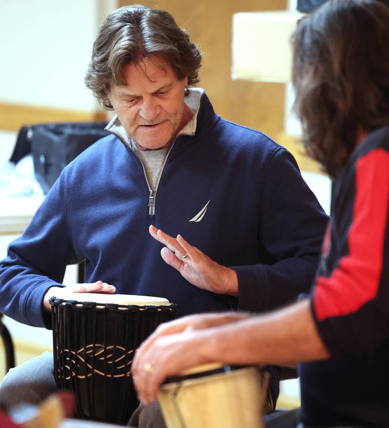 Veterans Ron Lofton (left) and Rob McCann play some drums Tuesday, Nov. 26, 2024 during the Kishwaukee Special Recreation Association’s Chords and Camaraderie at the Hopkins Park Community Center in DeKalb.