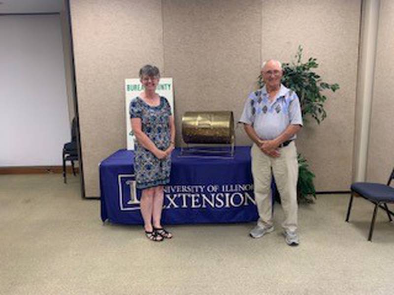 Gerri Frank, of Beck Oil Company (left), and Francis Morse, Friends of 4-H and Extension, draw the winning tickets for the annual Friends of 4-H and Extension cash raffle to support Bureau County Extension and 4-H educational programming.