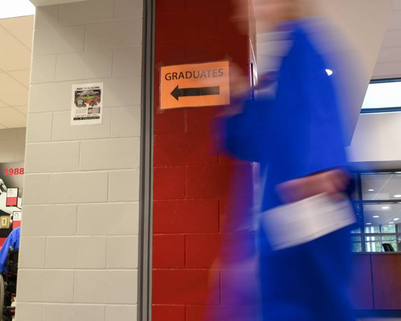 St. Charles North graduates move through the NIU Convocation Center in DeKalb for their commencement ceremony on Monday, May 18, 2026.