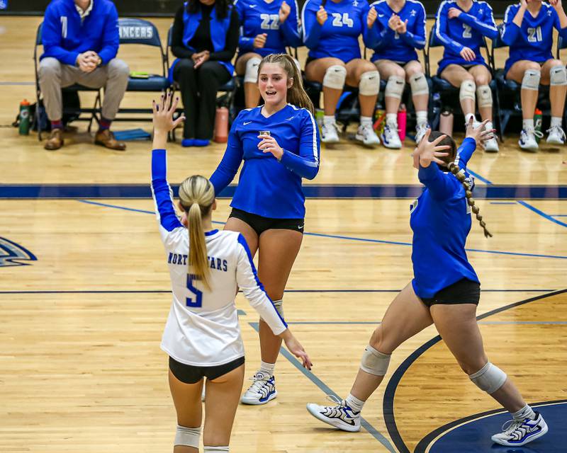 St Charles North celebrates the win over Wheaton North in the Class 4A Lake Park Regional final volleyball match.  Oct 31, 2024  in Roselle