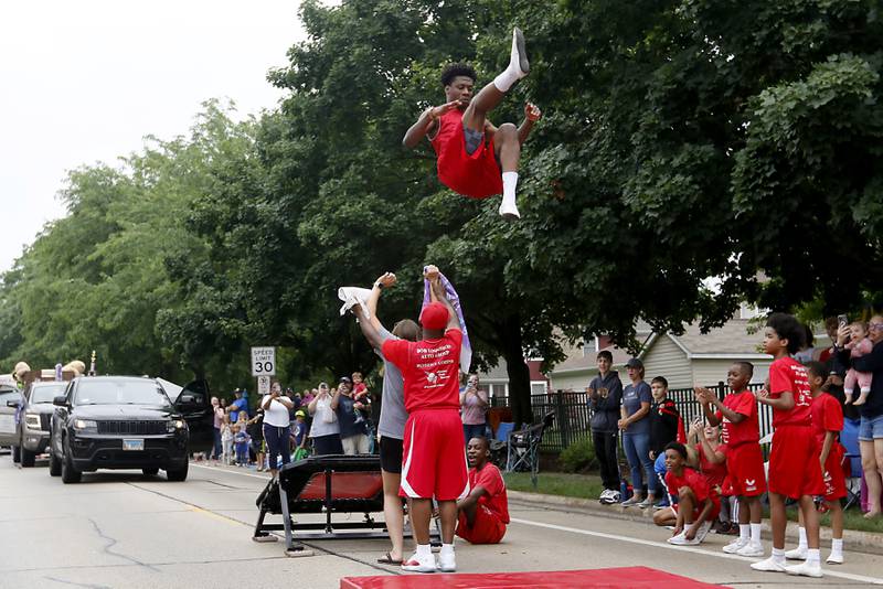 The Jesse White Tumblers perform Sunday, July 2, 2023 during Crystal Lake’s annual Independence Day Parade on Dole Avenue in Crystal Lake. This year’s parade feature close to 100 units.