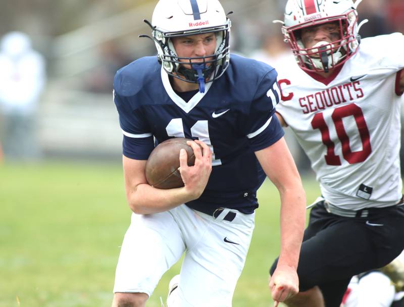 Cary-Grove’s Peyton Seaburg runs the ball for a touchdown against Antioch in IHSA Class 6A second-round playoff football action on Saturday, Nov. 9, 2024, at Al Bohrer Field on the campus of Cary-Grove High School in Cary..