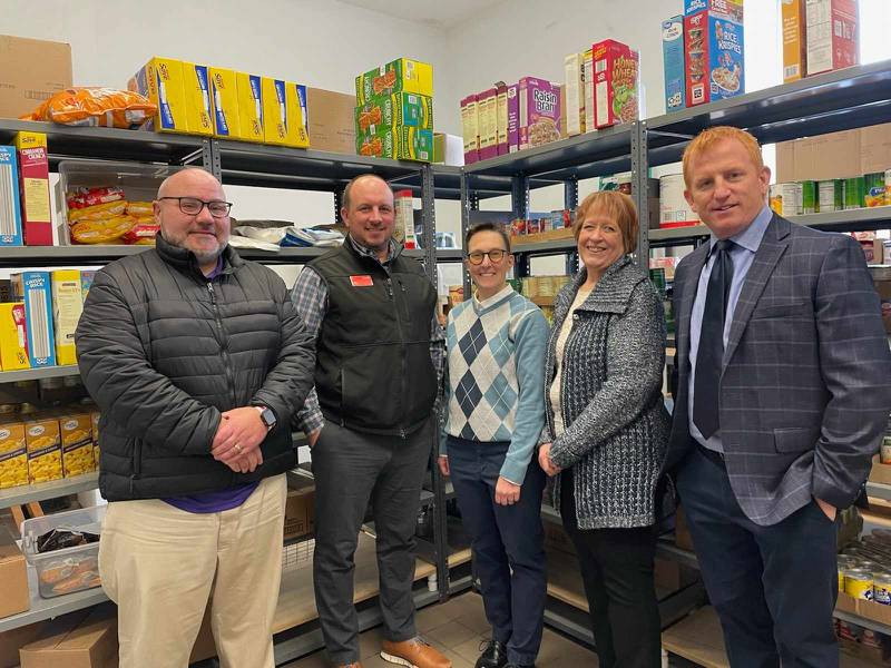 Rotary Club of Princeton recently collaborated with Midland States Bank and Bureau County United Way to provide a $2,500 donation to benefit the Bureau County Food Pantry. (From left) Nick Liebe of Midland States Bank, Joe Kitchens of Midland Wealth Management and Rotarian, Cori Cunningham of Bureau County United Way executive director, Vanessa Hoffeditz of Bureau County Food Pantry director and Eric May of Princeton Rotary Club president.