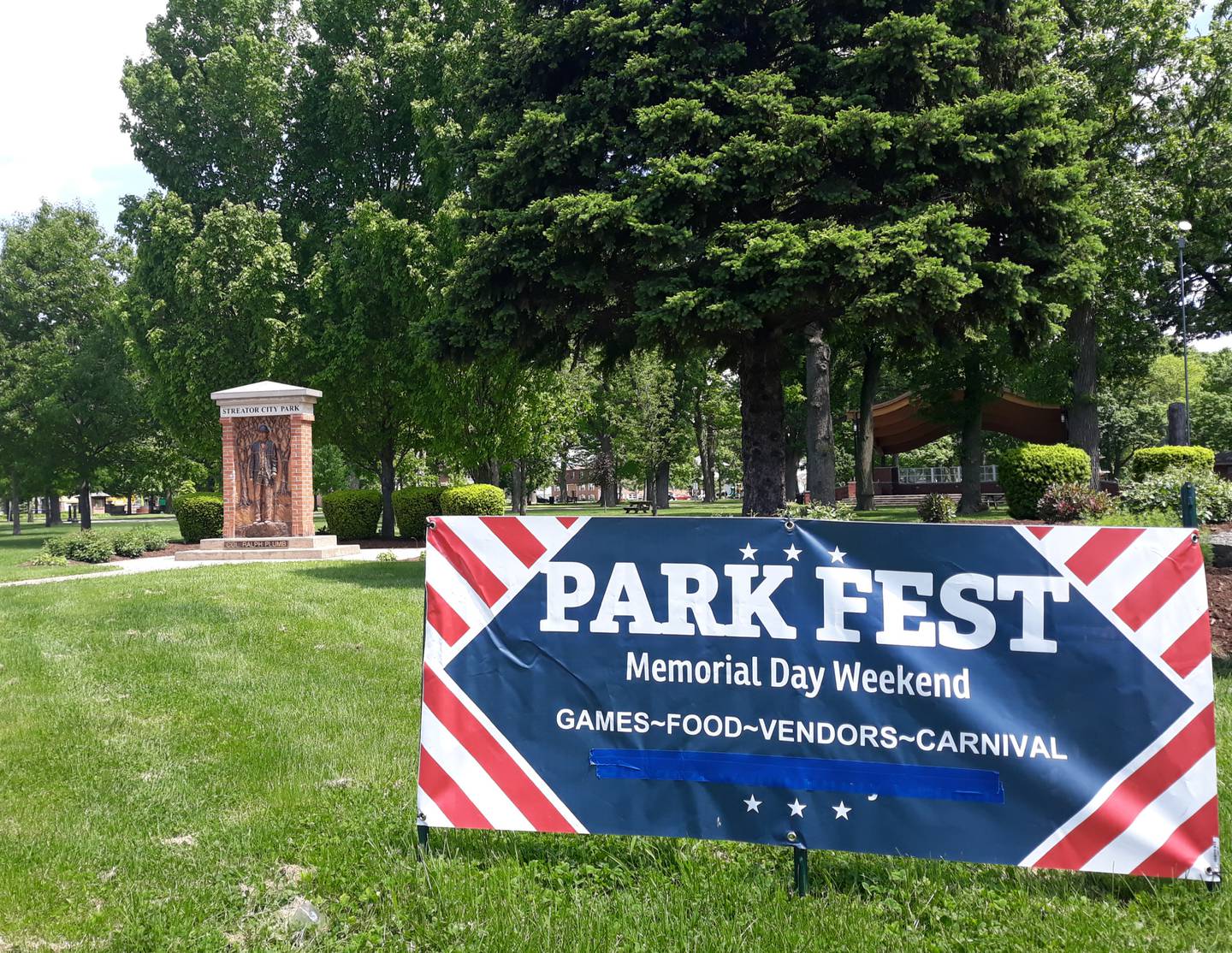 A sign at the southwest corner of City Park in Streator reminds residents Park Fest is scheduled Memorial Day weekend.