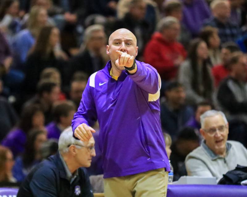 Downers Grove North's head coach Jim Thomas yells out instructions during varsity basketball game between Lyons at Downers Grove North.  Jan 31, 2023.