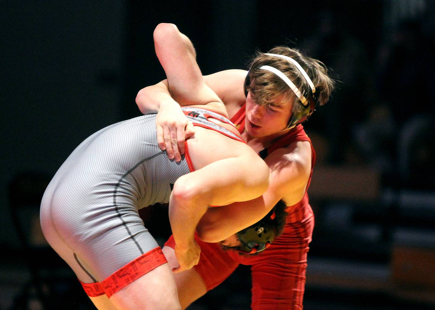 Batavia's Cael Andrews (top) competes against Yorkville's Cole Farren in the 145-pound weight class in a dual meet at Batavia on Wednesday, Jan. 26, 2022.
