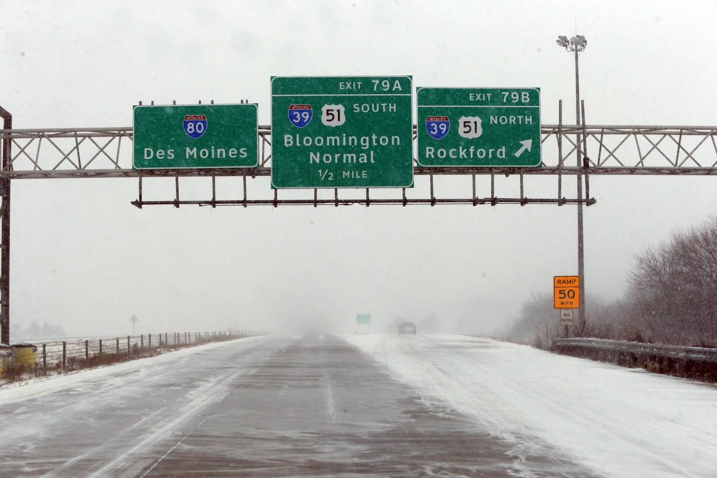 Snow begins to blow near the Interstate 80 and 39 interchange on Thursday Feb. 17, 2022.