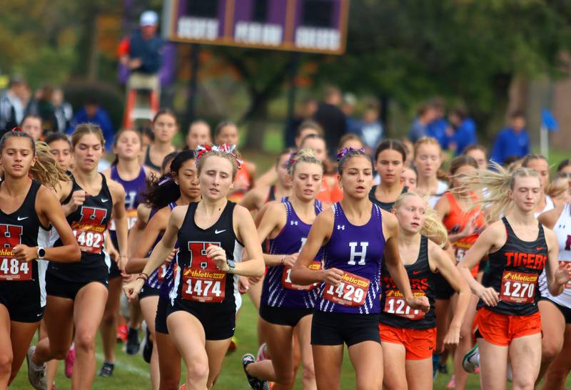 Girls runners begin the Fox Valley Conference Cross Country Meet at McHenry County College in Crystal Lake on Saturday, October. 18, 2025.