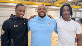 Elijah, Malachi Bell to join dad at Marian Central