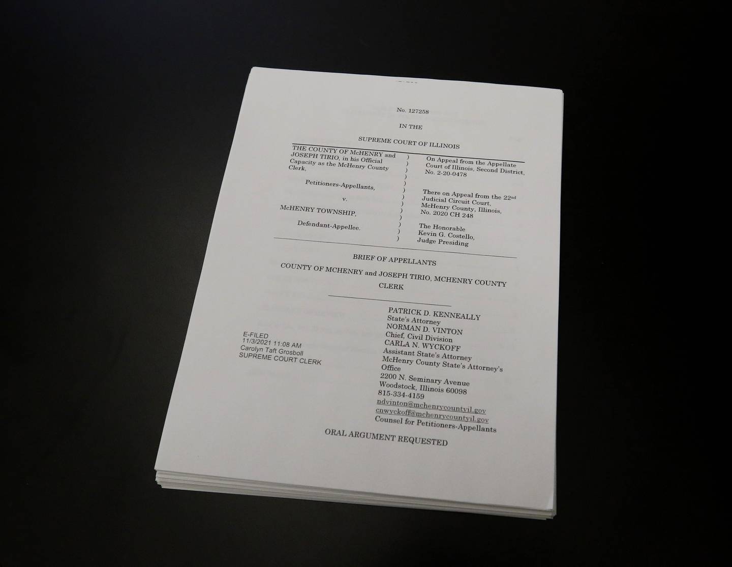 A copy of a court filing lies on a table in McHenry County Clerk Joe Tirio’s office the morning of Thursday, Jan. 20, 2022, in Woodstock, the day after the Illinois Supreme Court heard oral arguments in McHenry Township's court case against the Clerk's Office over the township's 2020 abolition attempt.