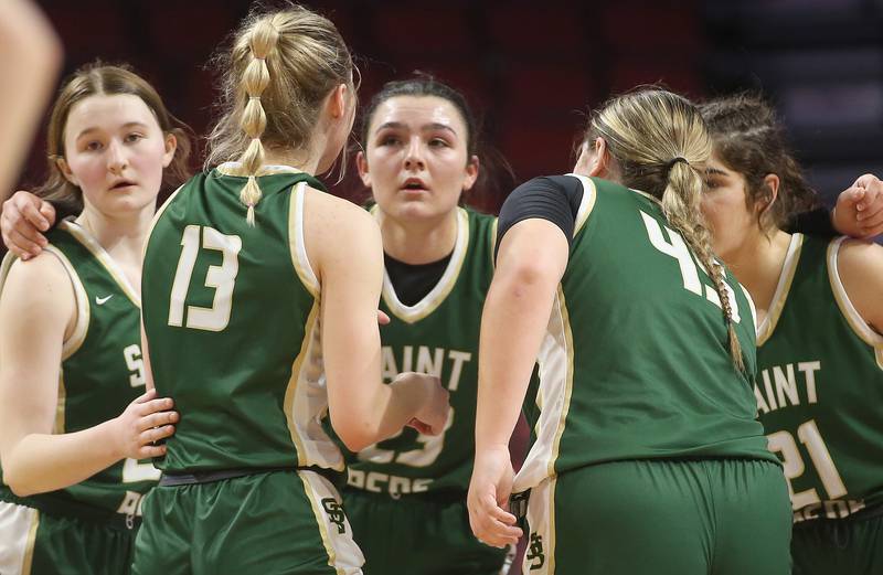 Members of the St. Bede girls basketball team huddle before a play against Altamont during the Class 1A third-place game on Thursday, Feb. 29, 2024 at CEFCU Arena in Normal.