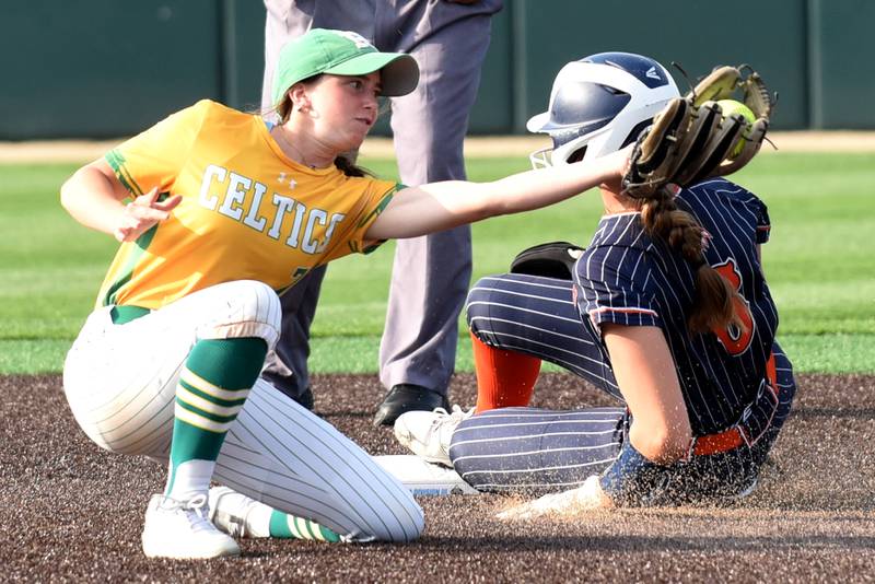 Providence's Bella Olszta, left, fields a late throw as Pontiac's India Mattingly steals second base during the Class 3A Illinois Wesleyan Supersectional Monday, June 9, 2025.