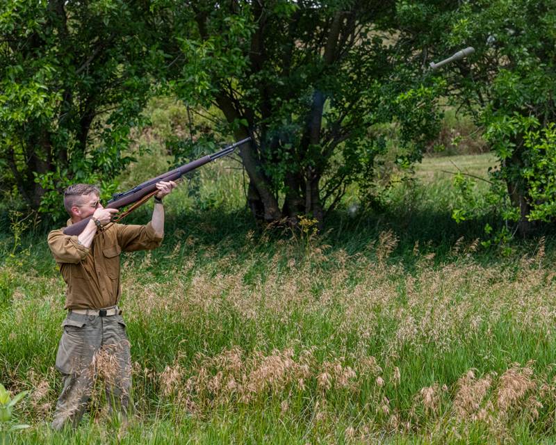 Travis Hanlin fires a dummy M9A1 anti tank rifle round out of his firearm to see how accurate he can get with it at the Ottawa Military Show on July 13, 2025 in rural Ottawa.