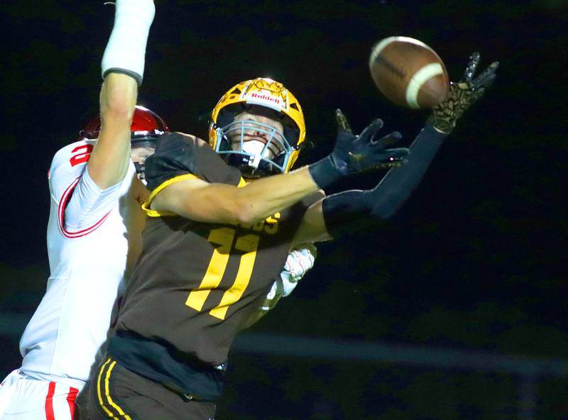 Huntley’s William Laughlin, back, breaks up a pass intended for Jacobs’  Carson Goehring in varsity football at Jacobs High School in Algonquin on Friday, Sept. 26, 2025.