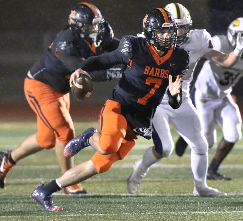 DeKalb's Adrien McVicar gets into the Neuqua Valley secondary on a run during their game Friday, Oct.14, 2022, at DeKalb High School.