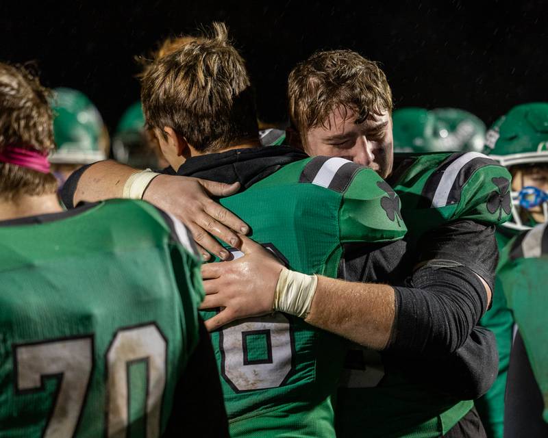 Seneca players embrace one another after playoff loss to Wilmington on Saturday, November 8, 2025 at Seneca High School in Seneca.