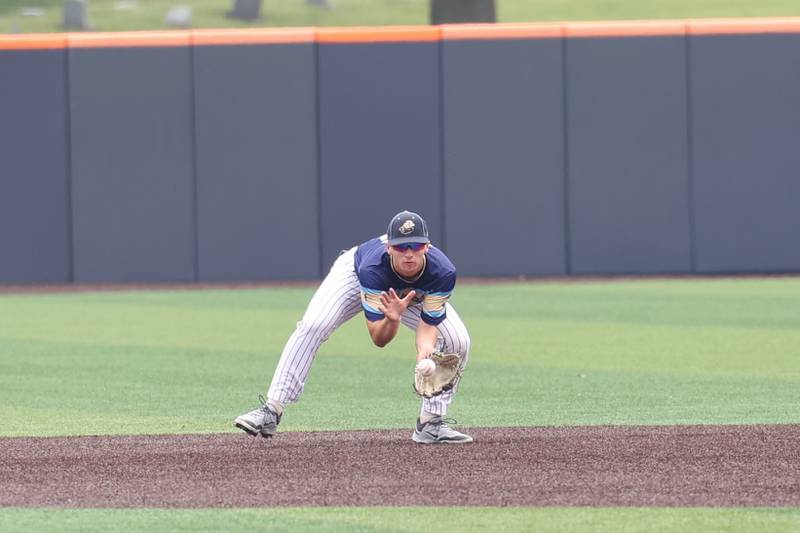 Ottawa Marquette’s Alec Novotney fields a grounder during the Crusaders' 16-1 victory over Lexington in the IHSA Class 1A State semifinal on Friday, June 6, 2025.