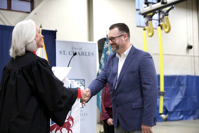 St. Charles Alderperson Steve Weber is sworn in by Circuit Court Judge Susan Clancy Boles on Monday, May 5, 2025 at the St. Charles Fire Department.