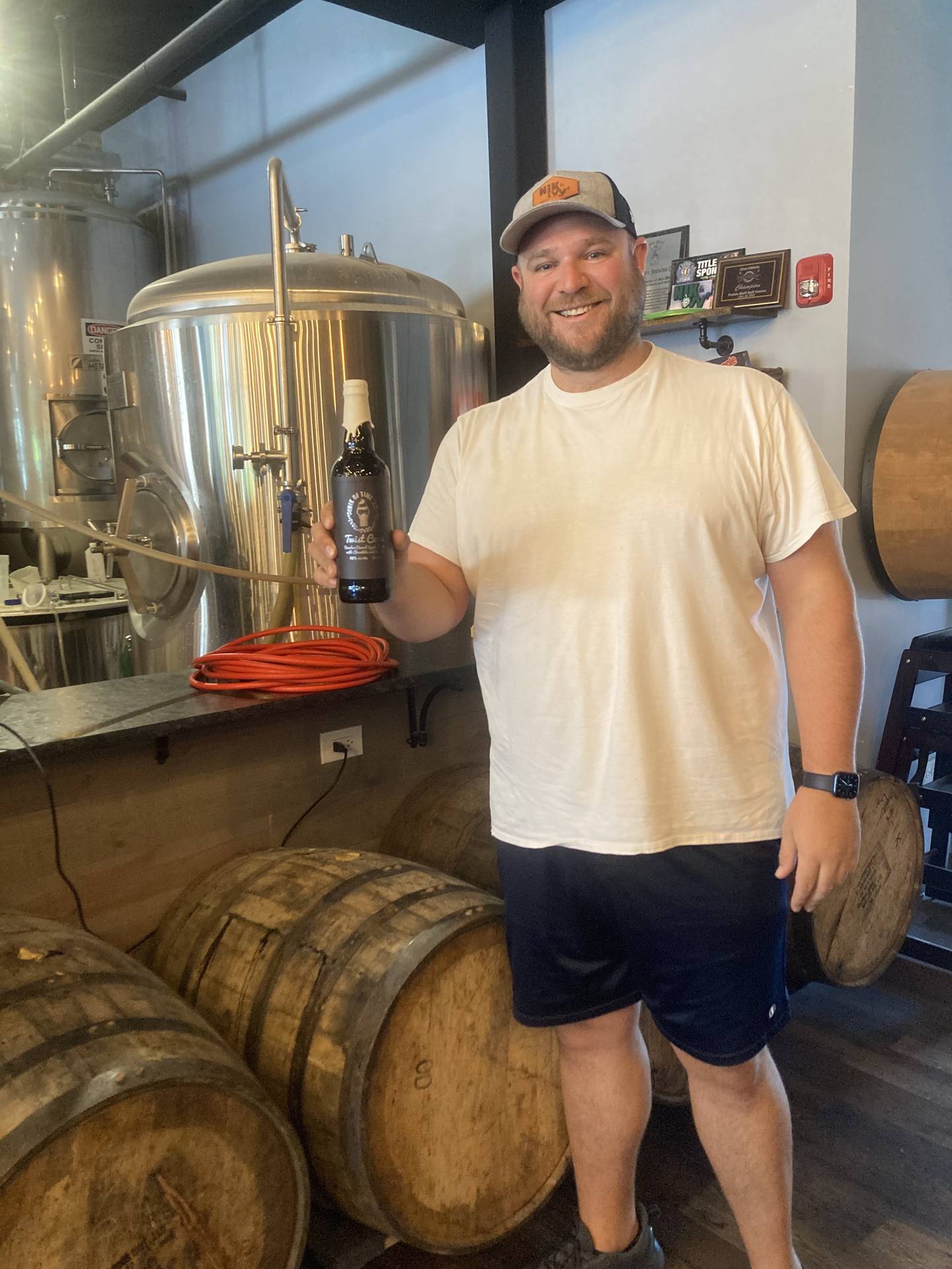 Paul Ivnik showcases the "twist cone" flavor of the Nik & Ivy's anniversary stout.