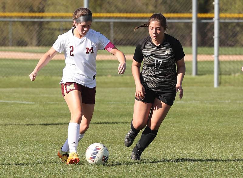 Morris' Ella McDonnel dribbles the ball ahead of Sycamore's Mariana Martinez during their Interstate 8 Conference Tournament semifinal game Wednesday, May 3, 2023, at Sycamore High School.