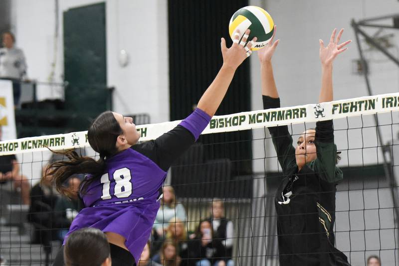 Bishop McNamara's Trinitee Thompson, right, looks to block a hit from Manteno's Maddie Gesky during a game at Bishop McNamara Monday, Oct. 20, 2025.