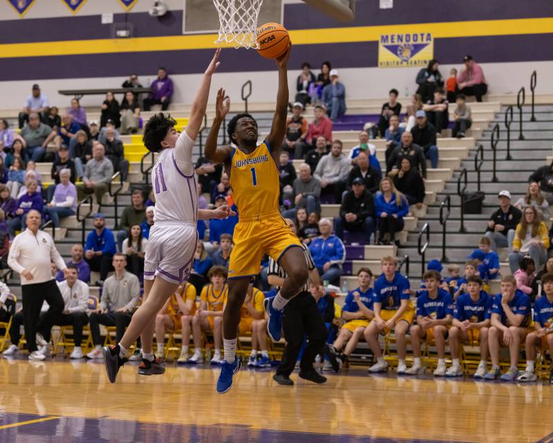 Jarrel Albea puts a shot up against Evan Krull of Rockford Lutheran during the IHSA 2A Sectional Championship game on March 6, 2026 at Mendota High School.