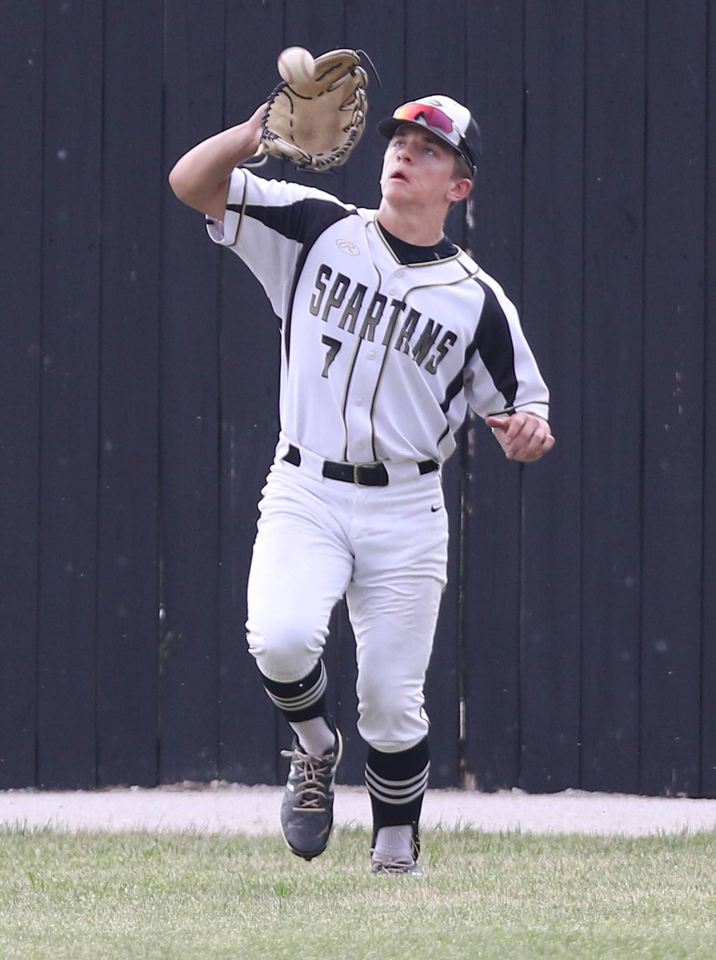 Sycamore sophomore Kiefer Tarnoki catches a line drive during their regional championship game against Burlington Central Monday afternoon at the Sycamore Community Sports Complex.