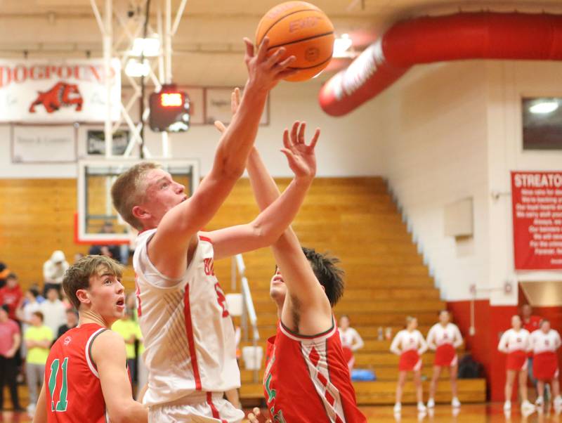 Streator's Joseph Hoekstra drives to the hoop in front of L-P's Jameson Hill and Erick Sotelo on Tuesday, Jan. 13, 2026 in Pops Dale Gymnasium at Streator High School.