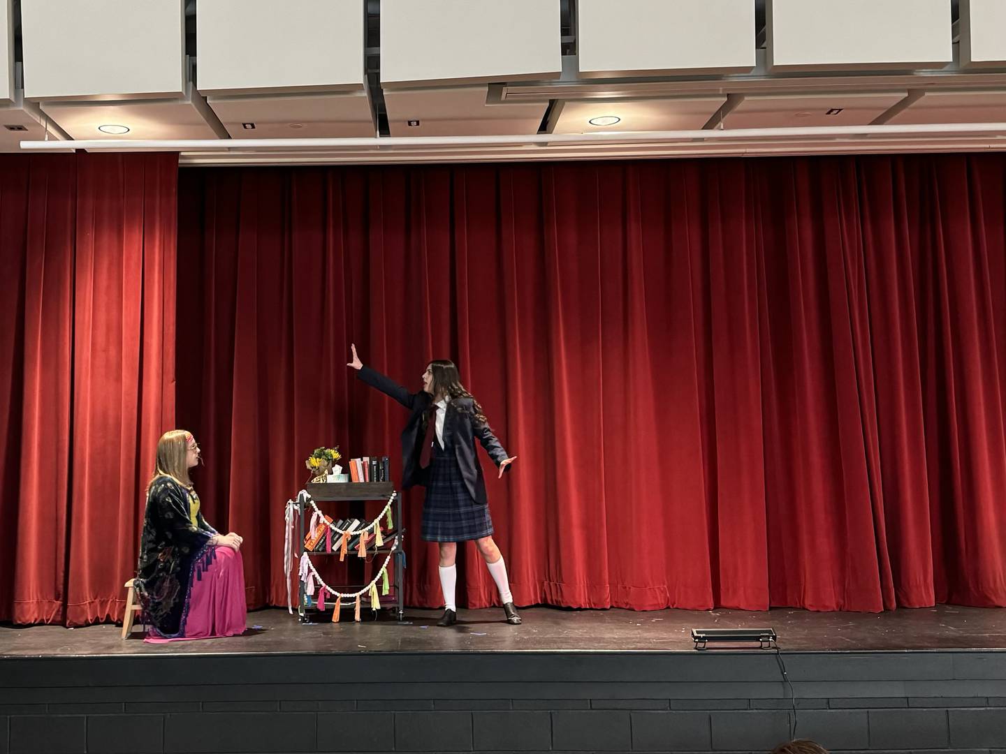 Matilda, played by Abby Borchers, sings and poses while rehearsing for Saratoga Elementary's spring play, "Matilda."