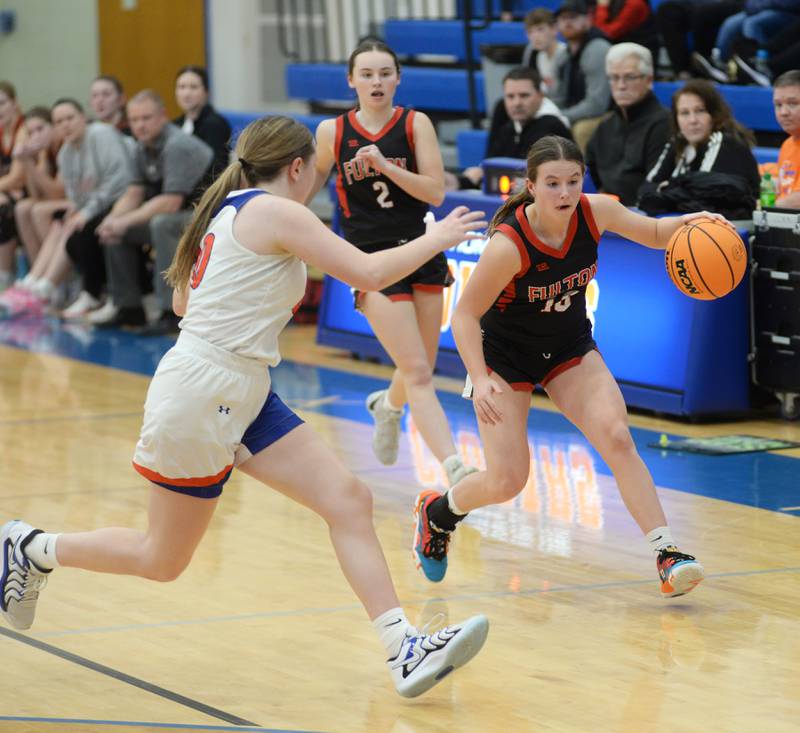 Fulton's Wrenn Coffey (10) looks to avoid an Eastland defender during a Friday, Dec. 13, 2024 game at Eastland High School in Lanark.
