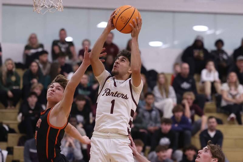 Lockport’s Ramzy Barbarawi gets the basket and the foul against Lincoln-Way West on Friday, Dec. 6, 2024 in Lockport.