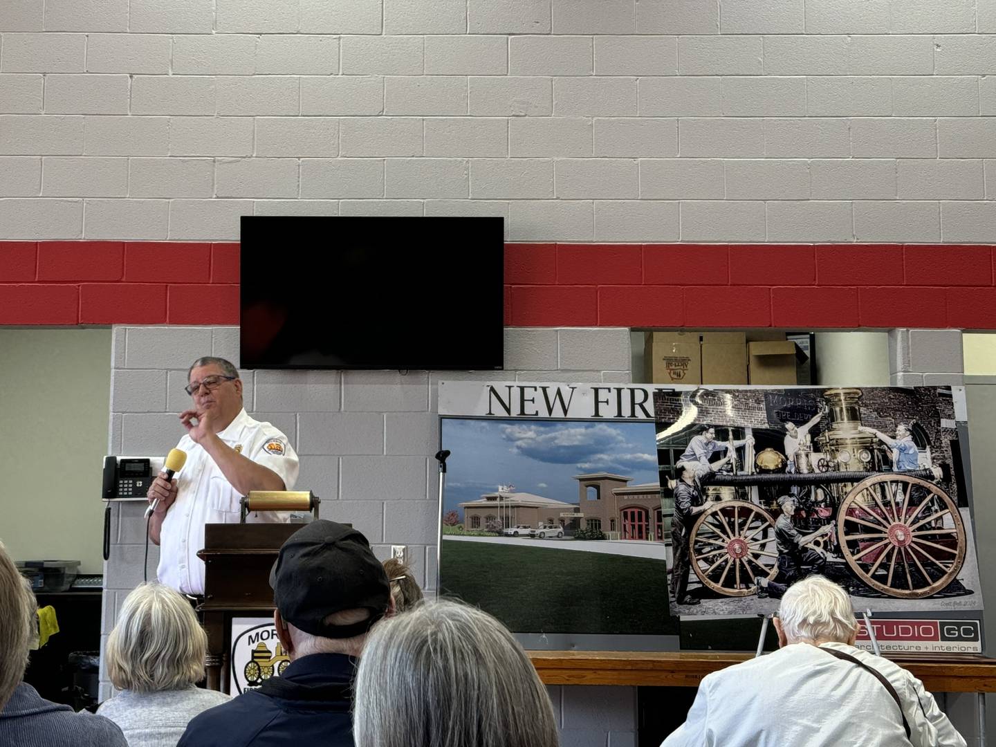 Morris Fire Chief Tracey Steffes addresses the crowd at the opening of the new Morris Fire Station at 200 Armstrong St. Morris.