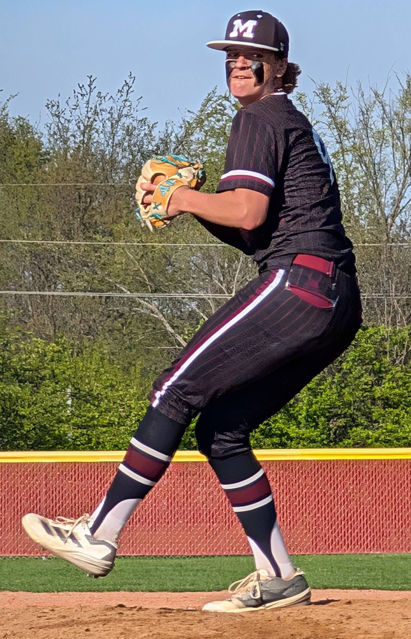 Marengo pitcher Alex Johnson delivers to the plate against Richmond-Burton in a Kishwaukee River Conference game Tuesday, May 6, 2025, in Richmond.