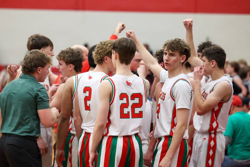 Players of L-P huddle during time out on Saturday, December 14, 2024 at Hall High School in Spring Valley.