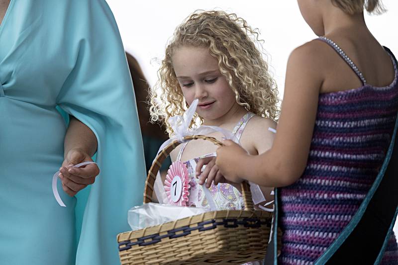 Hadley McMullen picks a question Wednesday August 2, 2023 during the Little Miss Ogle County pageant.