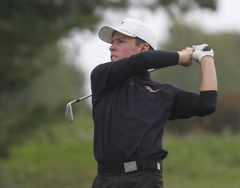 Crystal Lake Central’s Jack Bice watches his tee shot on the eight hole during the IHSA Class 3A Hampshire Regional golf tournament on Wednesday, Sept. 27, 2023, at Randall Oaks Golf Club in West Dundee.