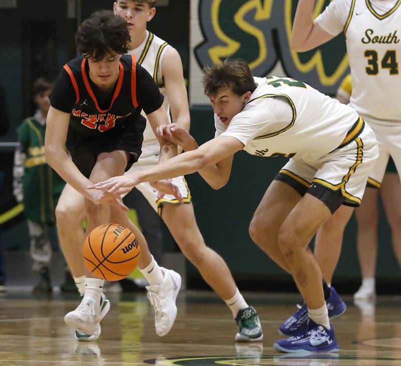 Crystal Lake South's Anthony Santarelli tries to steal the ball from McHenry's Marko Stojich during a Fox Valley Conference basketball game on Friday, Jan. 31, 2025, at Crystal Lake South High School.