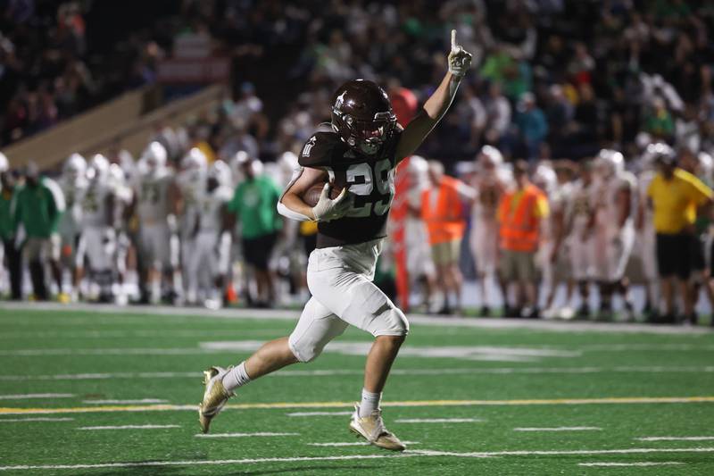 Joliet Catholic’s Keegan Farnaus trots in to score against Providence on Friday, Sept. 1, 2023 Joliet Memorial Stadium.