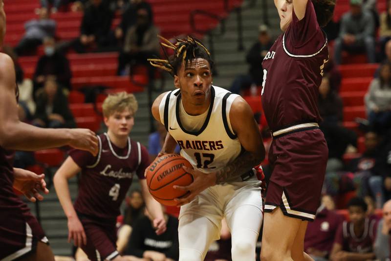 Bolingbrook’s Aries Hull looks to make a play against Lockport on Friday, February 10th.