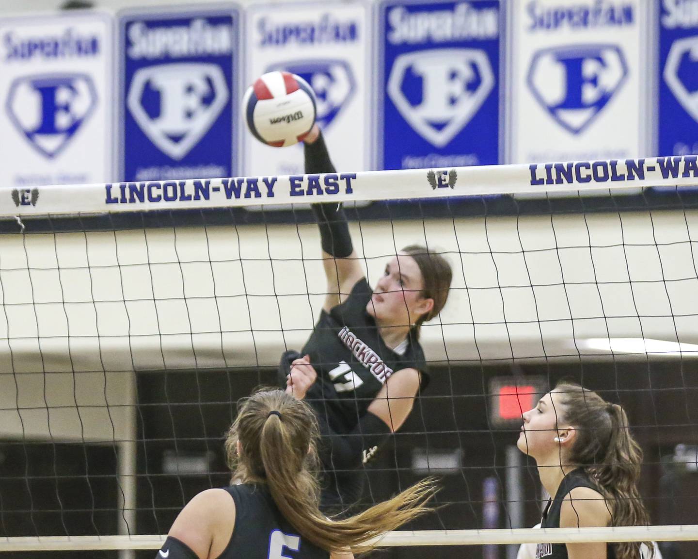 Lockport's Bridget Ferriter (17) with a kill attempt during volleyball match between Lockport at Lincoln-Way East. Oct 14, 2025.