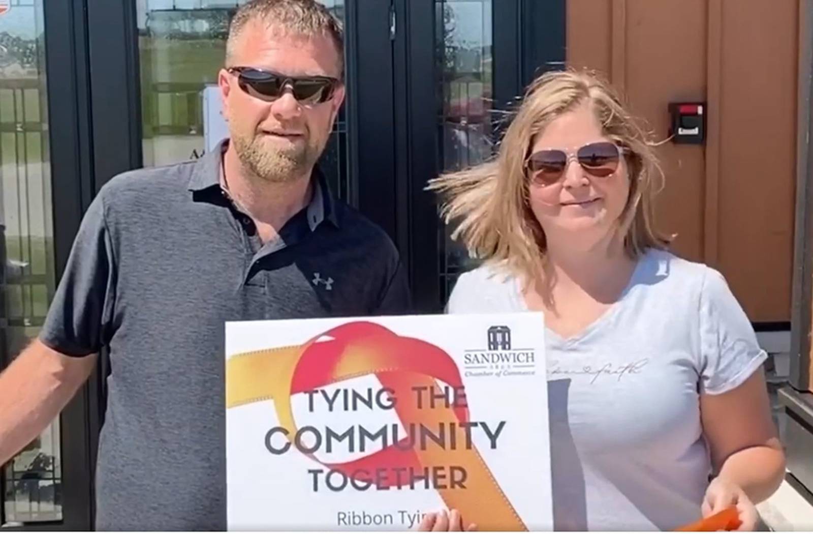 Sandwich Chamber visits with A&B Exteriors Shaw Local